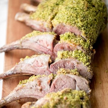 This delicious garlic and herb-crusted rack of lamb is tender, juicy, and flavourful. It is surprisingly quick and easy to make at home in about 30 minutes. | aheadofthyme.com