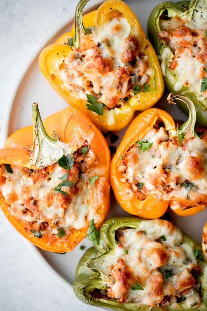 Leftover turkey stuffed peppers are a nutritious, wholesome and healthy dinner that you can throw together easily and quickly. A total crowd-pleaser. | aheadofthyme.com