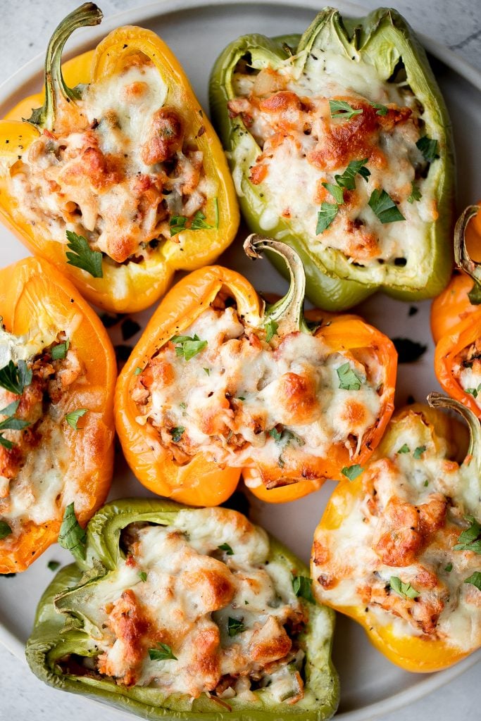 Leftover turkey stuffed peppers are a nutritious, wholesome and healthy dinner that you can throw together easily and quickly. A total crowd-pleaser. | aheadofthyme.com