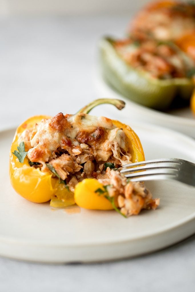 Leftover turkey stuffed peppers are a nutritious, wholesome and healthy dinner that you can throw together easily and quickly. A total crowd-pleaser. | aheadofthyme.com