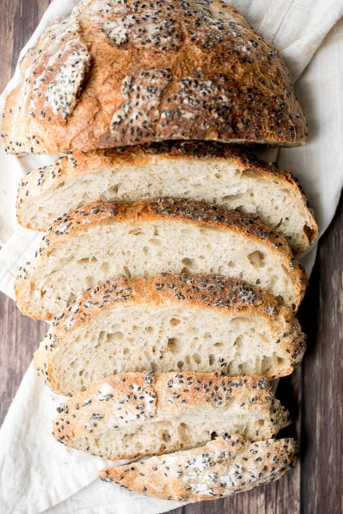 No knead sesame bread is chewy, springy and airy with the perfect crunchy crust coated with sesame seeds. Easy to make with 10 minutes prep and no kneading. | aheadofthyme.com