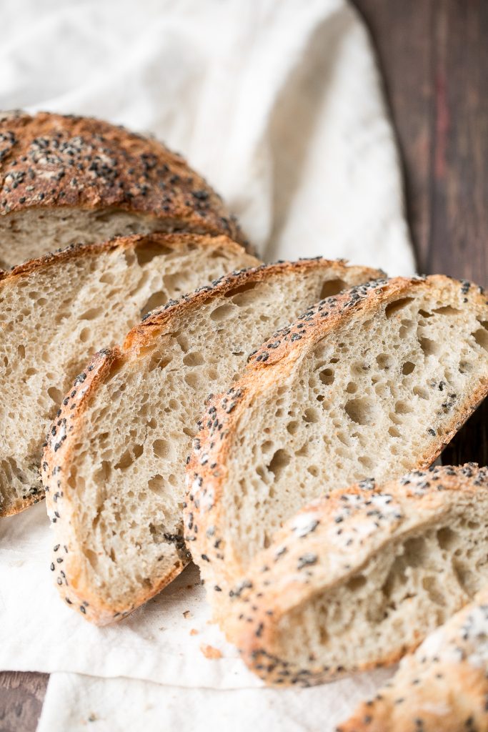 No knead sesame bread is chewy, springy and airy with the perfect crunchy crust coated with sesame seeds. Easy to make with 10 minutes prep and no kneading. | aheadofthyme.com