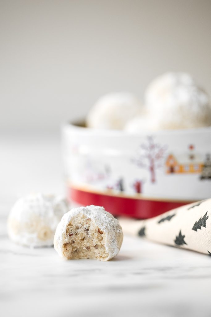 Sweet and nutty pecan snowball cookies (Russian tea cakes or Mexican wedding cookies) are little melt-in-your-mouth balls of buttery shortbread with nuts. | aheadofthyme.com