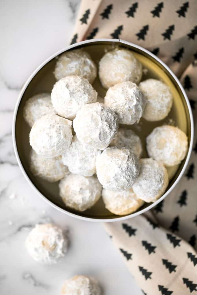 Sweet and nutty pecan snowball cookies (Russian tea cakes or Mexican wedding cookies) are little melt-in-your-mouth balls of buttery shortbread with nuts. | aheadofthyme.com