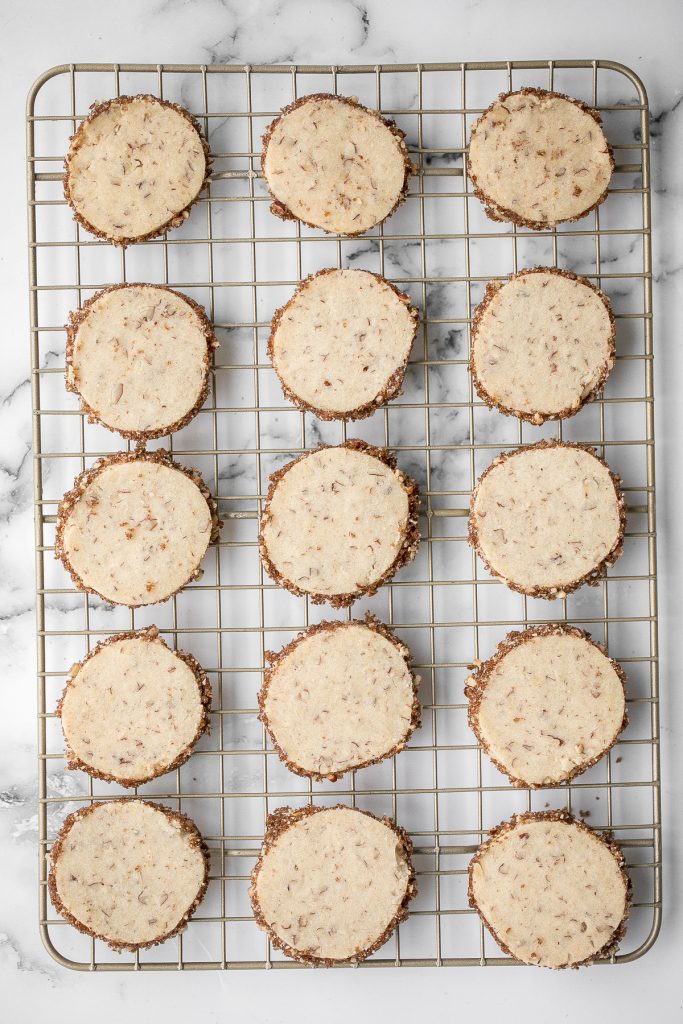 Easy slice and bake pecan shortbread cookies are sweet, nutty and buttery shortbread cookies packed with finely chopped pecans that melt in your mouth. | aheadofthyme.com