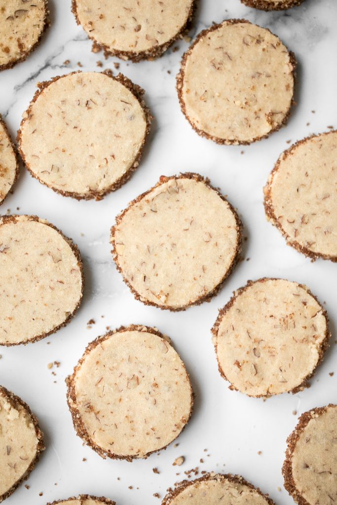 Easy slice and bake pecan shortbread cookies are sweet, nutty and buttery shortbread cookies packed with finely chopped pecans that melt in your mouth. | aheadofthyme.com
