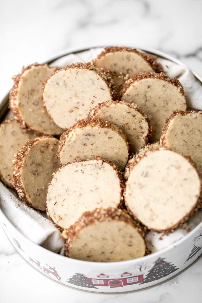 Easy slice and bake pecan shortbread cookies are sweet, nutty and buttery shortbread cookies packed with finely chopped pecans that melt in your mouth. | aheadofthyme.com