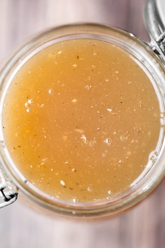 Nutritious wholesome slow cooker bone broth is healing, promotes physical wellness and health, and is easy to make at home. Add it to soups, stews and more. | aheadofthyme.com