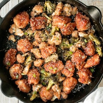 Better than takeout, baked sesame chicken with vegetables is delicious, flavourful, sticky and saucy. This healthier Chinese dish is quick and easy to make. | aheadofthyme.com