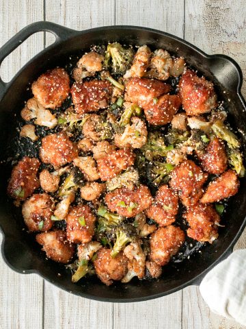 Better than takeout, baked sesame chicken with vegetables is delicious, flavourful, sticky and saucy. This healthier Chinese dish is quick and easy to make. | aheadofthyme.com