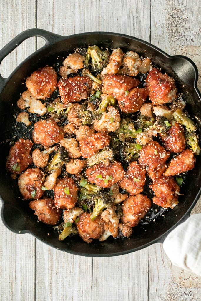 Better than takeout, baked sesame chicken with vegetables is delicious, flavourful, sticky and saucy. This healthier Chinese dish is quick and easy to make. | aheadofthyme.com