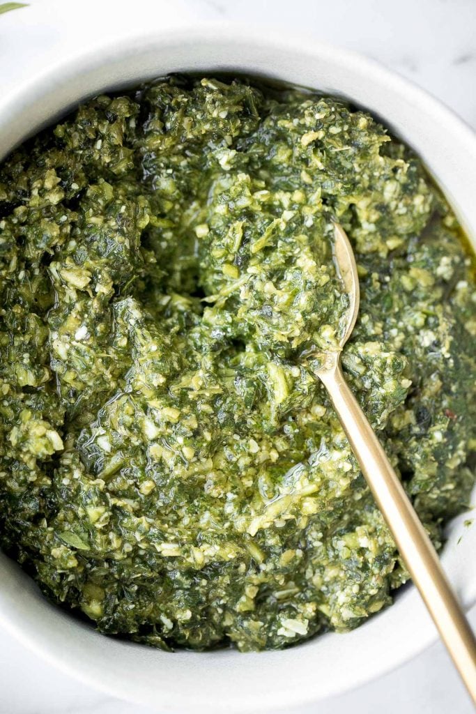 Fresh homemade basil pesto is vibrant, colourful, flavourful and extremely easy to make at home in just 5 minutes with a few ingredients. | aheadofthyme.com