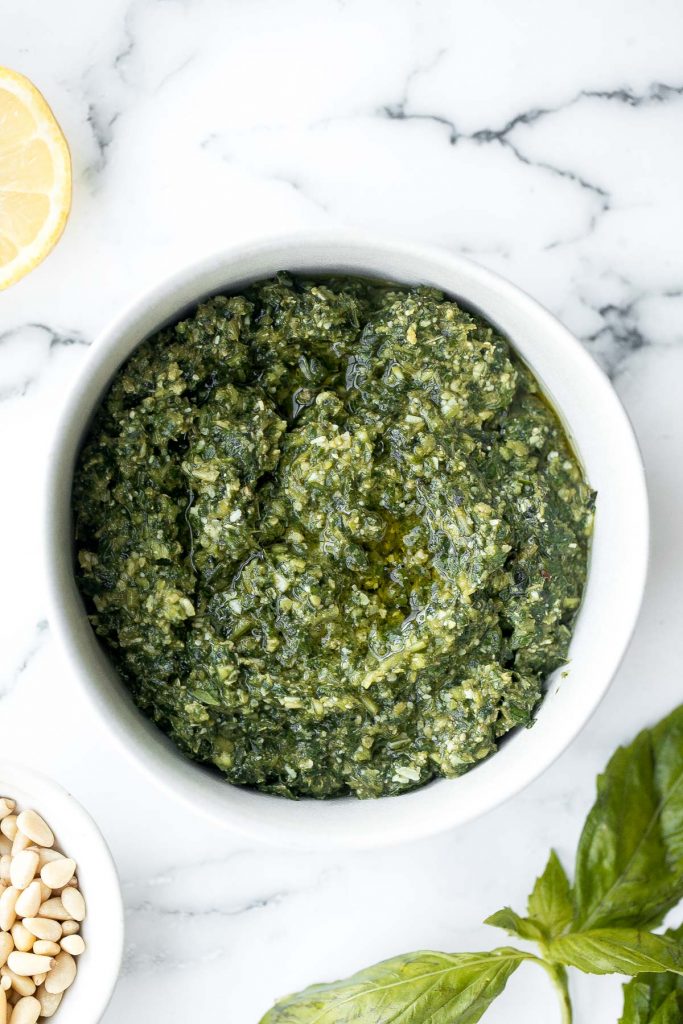 Fresh homemade basil pesto is vibrant, colourful, flavourful and extremely easy to make at home in just 5 minutes with a few ingredients. | aheadofthyme.com