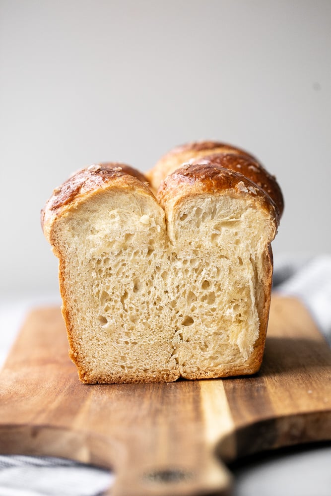 Brioche bread is a buttery, soft and pillowy pastry-like bread rich in flavour with a beautiful golden brown crust. Made with 20 minutes of prep work. | aheadofthyme.com