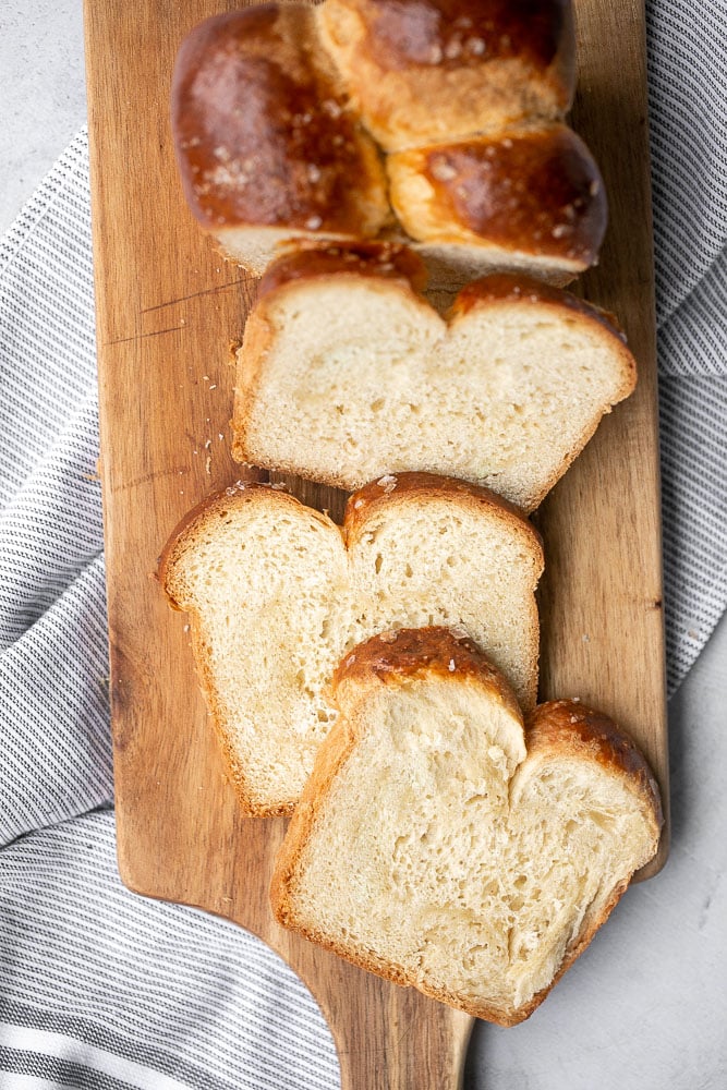 Brioche bread is a buttery, soft and pillowy pastry-like bread rich in flavour with a beautiful golden brown crust. Made with 20 minutes of prep work. | aheadofthyme.com