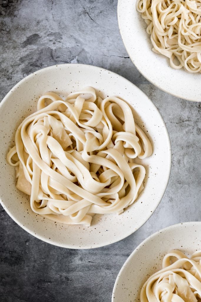 Hand-pulled noodles (la mian 拉面) are springy, chewy and delicious traditional homemade noodles that are rolled and stretched into long strips. | aheadofthyme.com