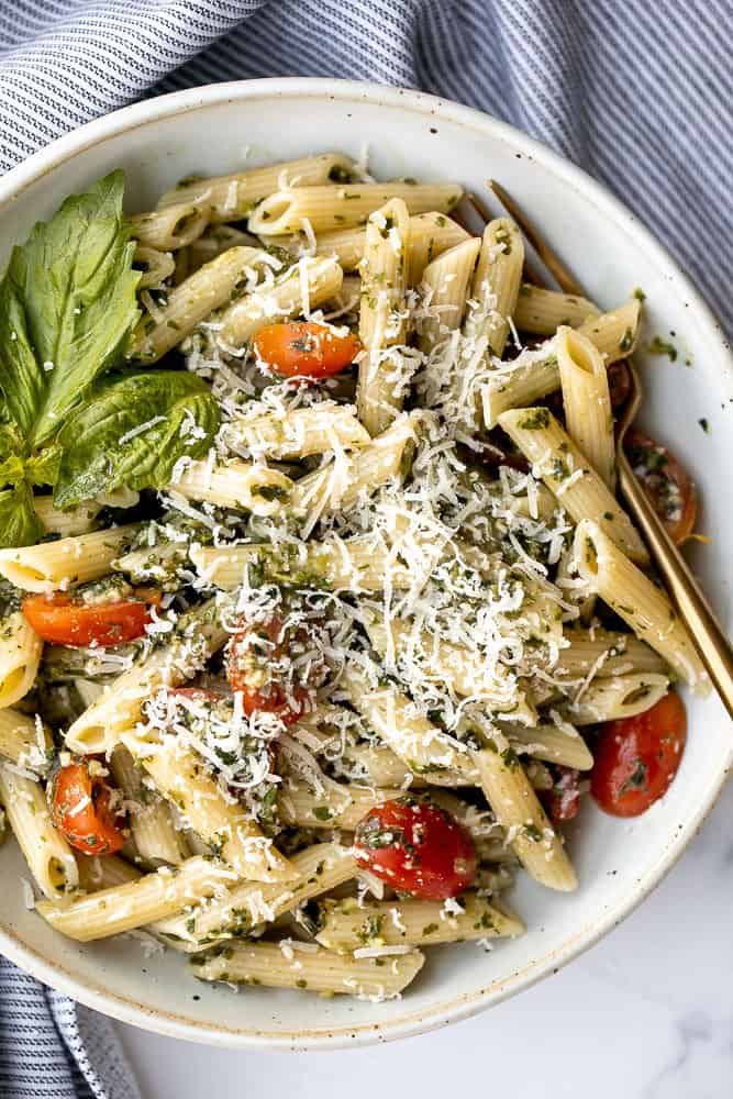Quick and easy pesto penne pasta is a simple and light Italian pasta dish made with just five ingredients in under 15 minutes. The easiest dinner. | aheadofthyme.com