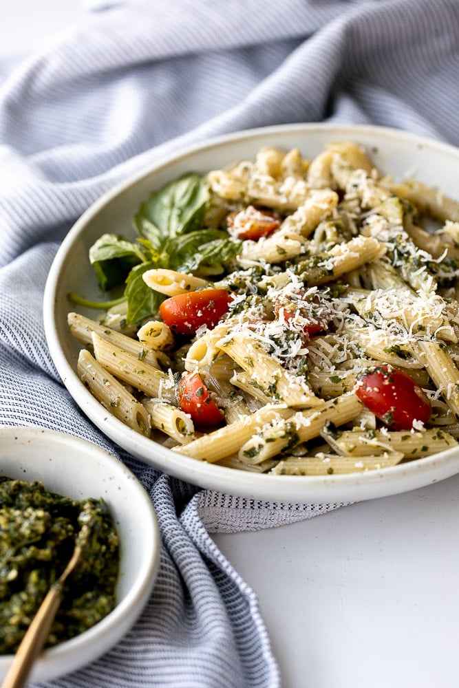 Quick and easy pesto penne pasta is a simple and light Italian pasta dish made with just five ingredients in under 15 minutes. The easiest dinner. | aheadofthyme.com