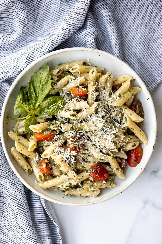 Quick and easy pesto penne pasta is a simple and light Italian pasta dish made with just five ingredients in under 15 minutes. The easiest dinner. | aheadofthyme.com