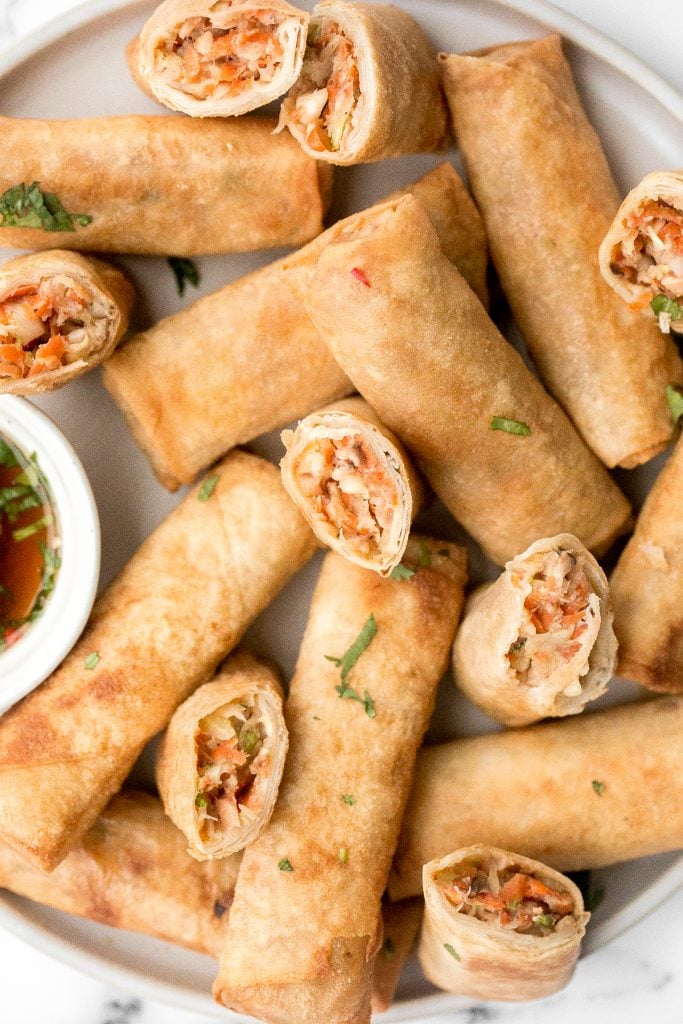 Better than takeout, shrimp egg rolls are a delicious, flavourful and easy appetizer to make. They can be deep fried, baked or air fried. | aheadofthyme.com