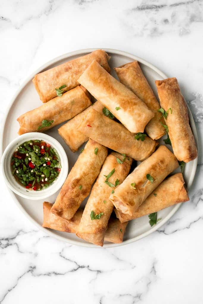Better than takeout, shrimp egg rolls are a delicious, flavourful and easy appetizer to make. They can be deep fried, baked or air fried. | aheadofthyme.com