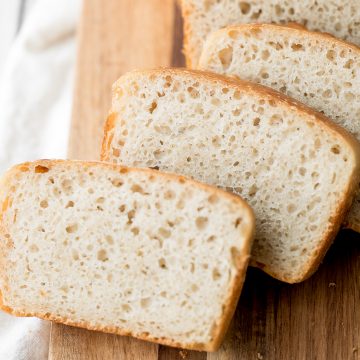 Sourdough sandwich bread is chewy with the perfect air holes inside, and has a crispy crust with a delicious signature sourdough taste. | aheadofthyme.com