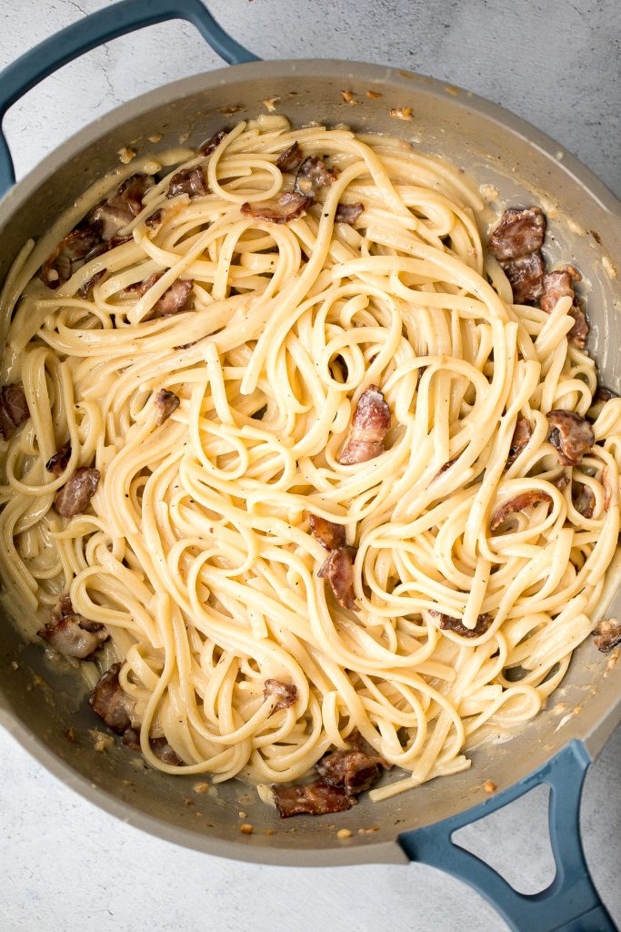 Creamy spaghetti carbonara (Spaghetti a la Carbonara) is a simple classic Italian pasta with pancetta that's quick and easy to make in minutes. | aheadofthyme.com