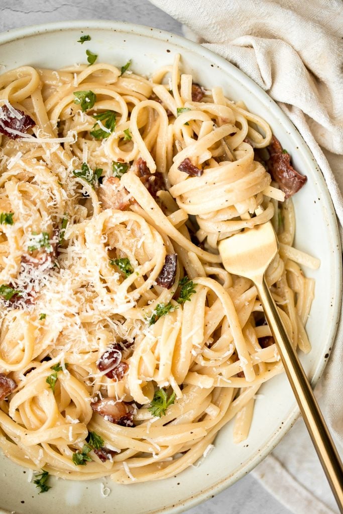 Creamy spaghetti carbonara (Spaghetti a la Carbonara) is a simple classic Italian pasta with pancetta that's quick and easy to make in minutes. | aheadofthyme.com