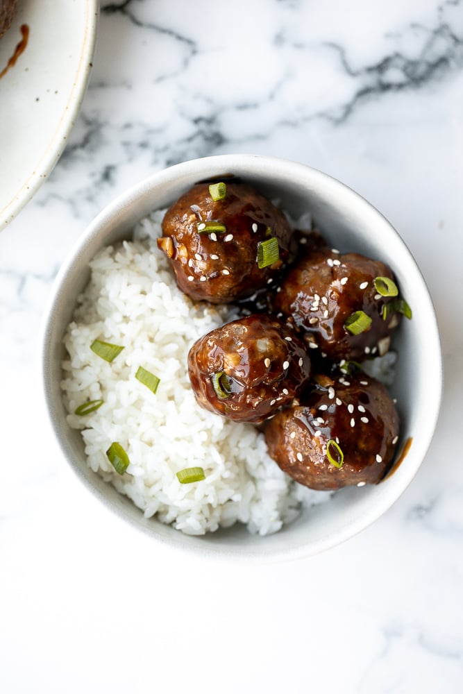 Sticky honey garlic meatballs are a delicious and flavourful 30-minute meal to add to your weekly dinner rotation. A total crowd pleaser. | aheadofthyme.com