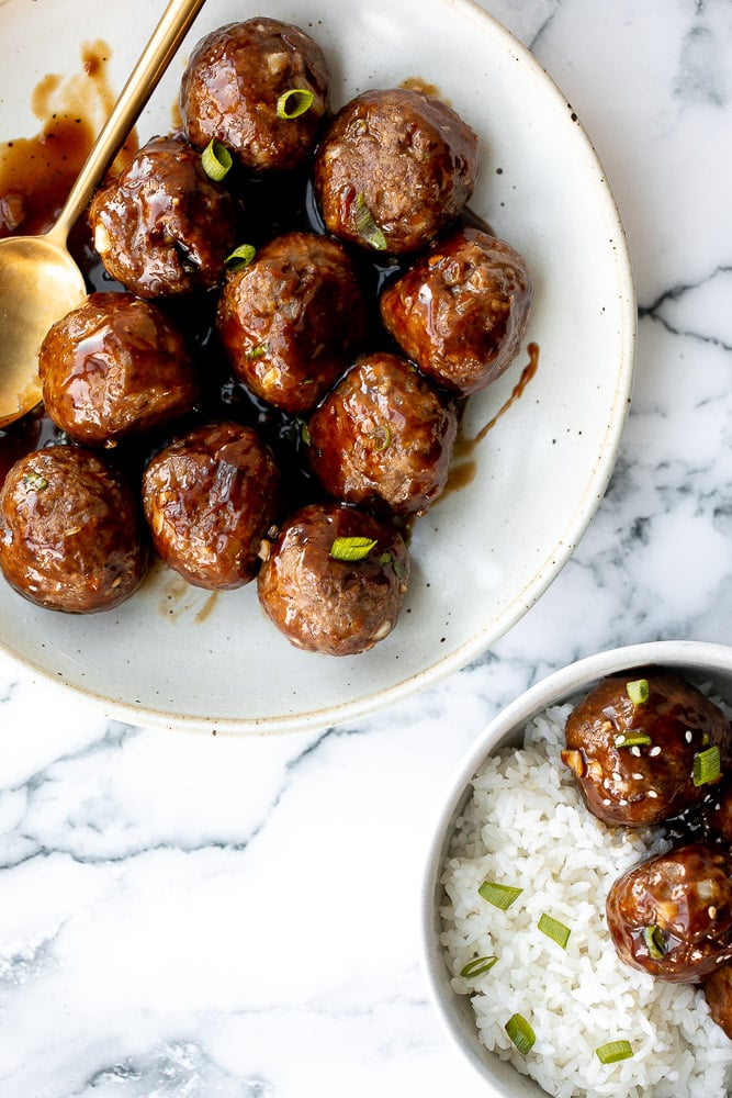 Sticky honey garlic meatballs are a delicious and flavourful 30-minute meal to add to your weekly dinner rotation. A total crowd pleaser. | aheadofthyme.com