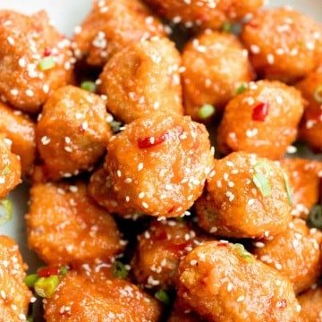 Sticky crispy baked sweet chili chicken bites is better than takeout and so easy to make healthier at home. An easy dinner or game day appy. | aheadofthyme.com