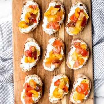 Whipped ricotta crostini is a fancy easy appetizer to make in just minutes or prepare in advance and assemble before serving. A total crowd pleaser. | aheadofthyme.com