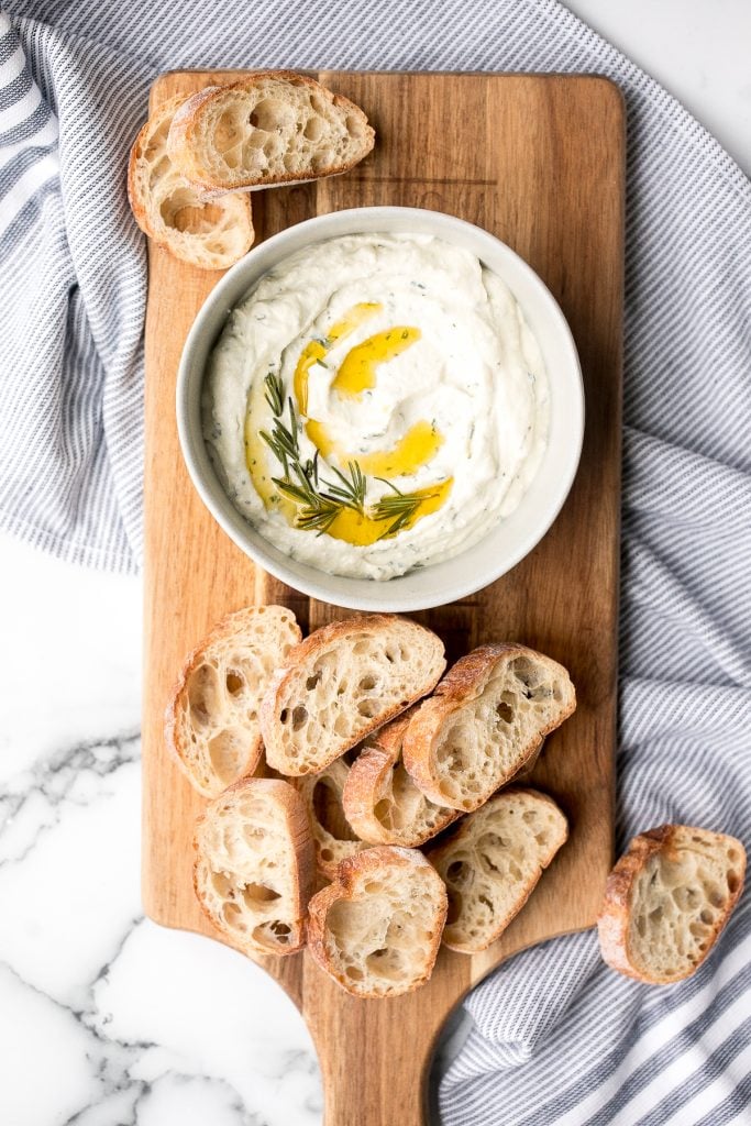 Light and airy, whipped ricotta dip is so easy to make in just 5 minutes with a few fresh ingredients including fresh herbs, olive oil, garlic, and honey. | aheadofthyme.com