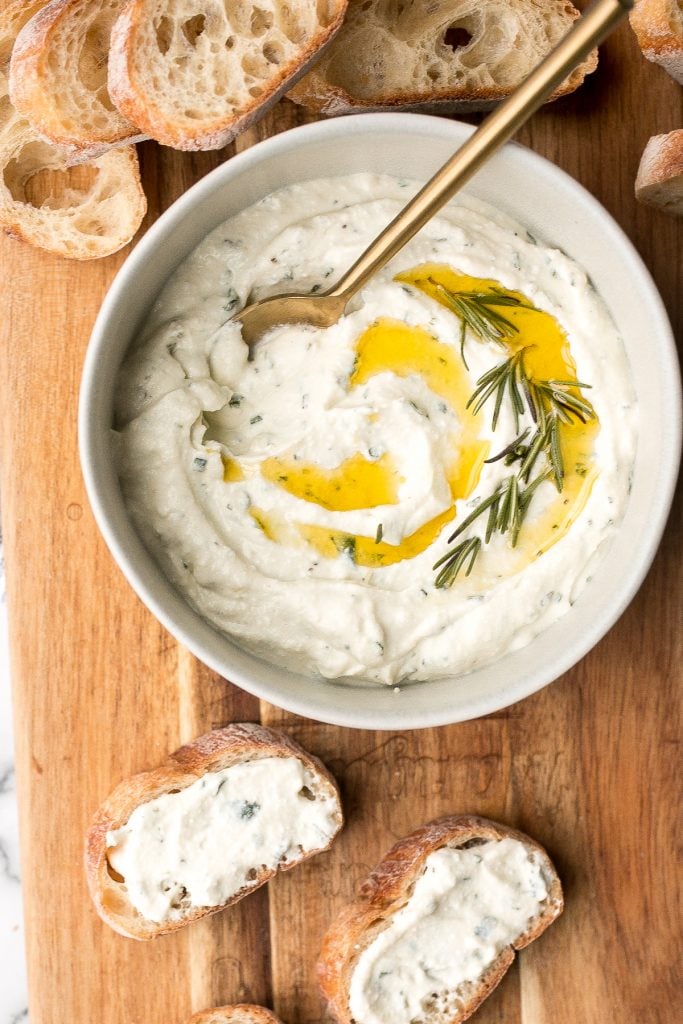 Light and airy, whipped ricotta dip is so easy to make in just 5 minutes with a few fresh ingredients including fresh herbs, olive oil, garlic, and honey. | aheadofthyme.com