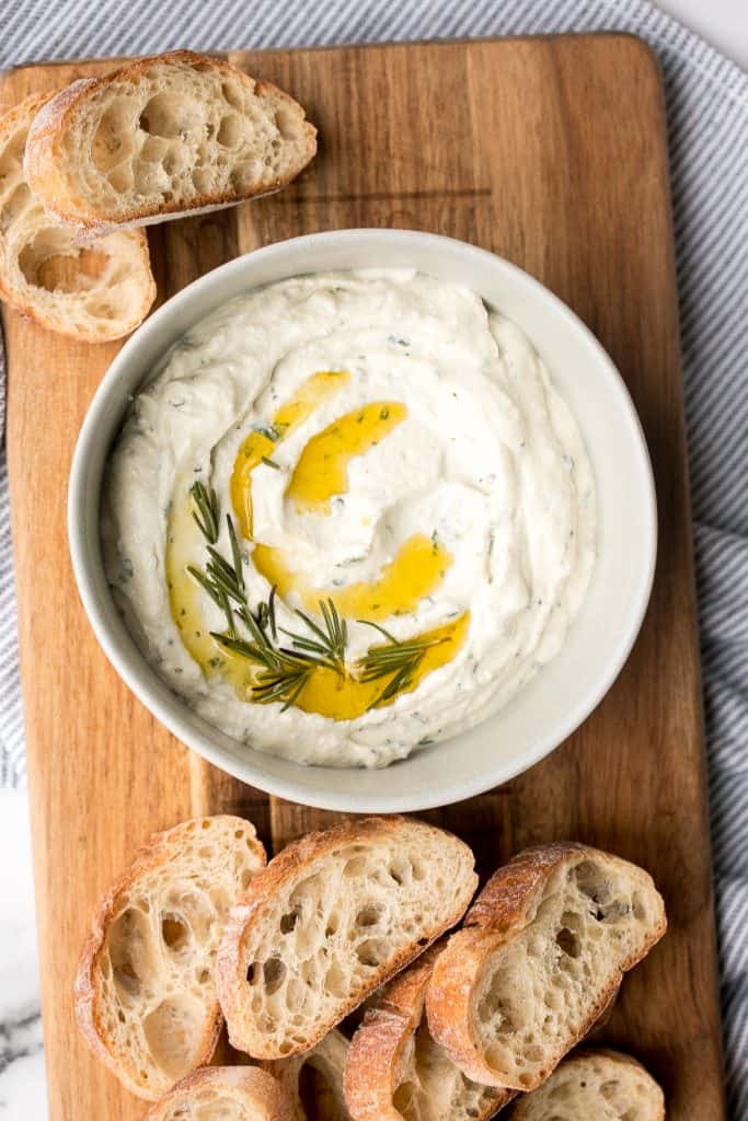 Light and airy, whipped ricotta dip is so easy to make in just 5 minutes with a few fresh ingredients including fresh herbs, olive oil, garlic, and honey. | aheadofthyme.com