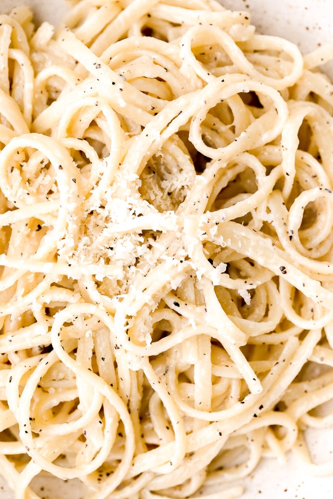 Cacio e pepe is a simple, authentic Italian pasta dish made with just four ingredients in 20 minutes. It's delicious, flavourful and easy to make. | aheadofthyme.com