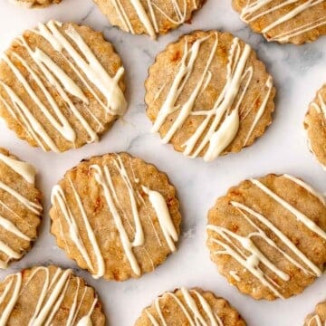 Carrot cake shortbread cookies are sweet and buttery, packed with carrots and walnuts, and spiced like your favourite carrot cake. A total treat. | aheadofthyme.com