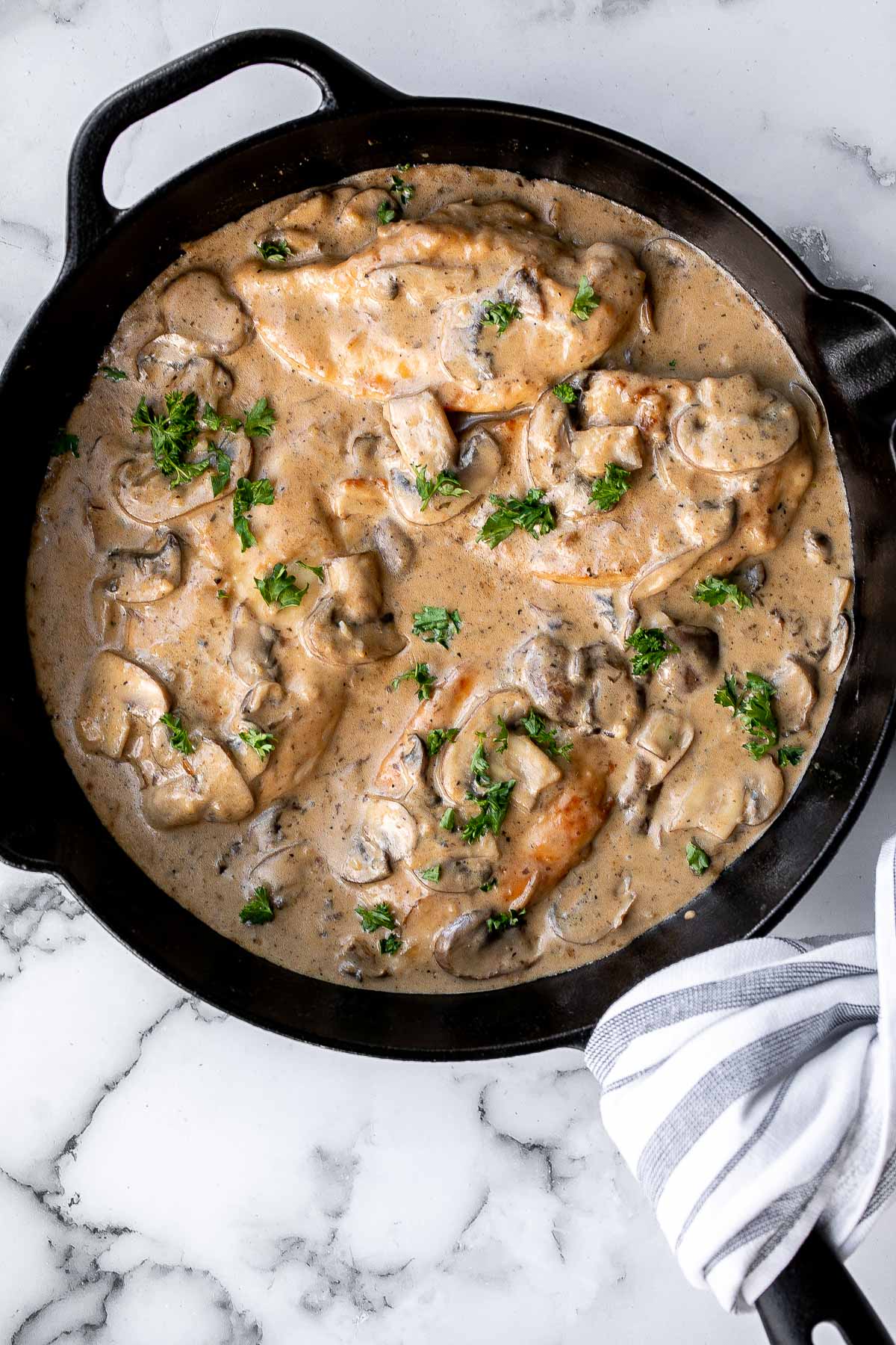 Chicken marsala in creamy mushroom sauce is a quick and easy 30-minute chicken dinner that is pure comfort food goals. A total crowd favourite. | aheadofthyme.com