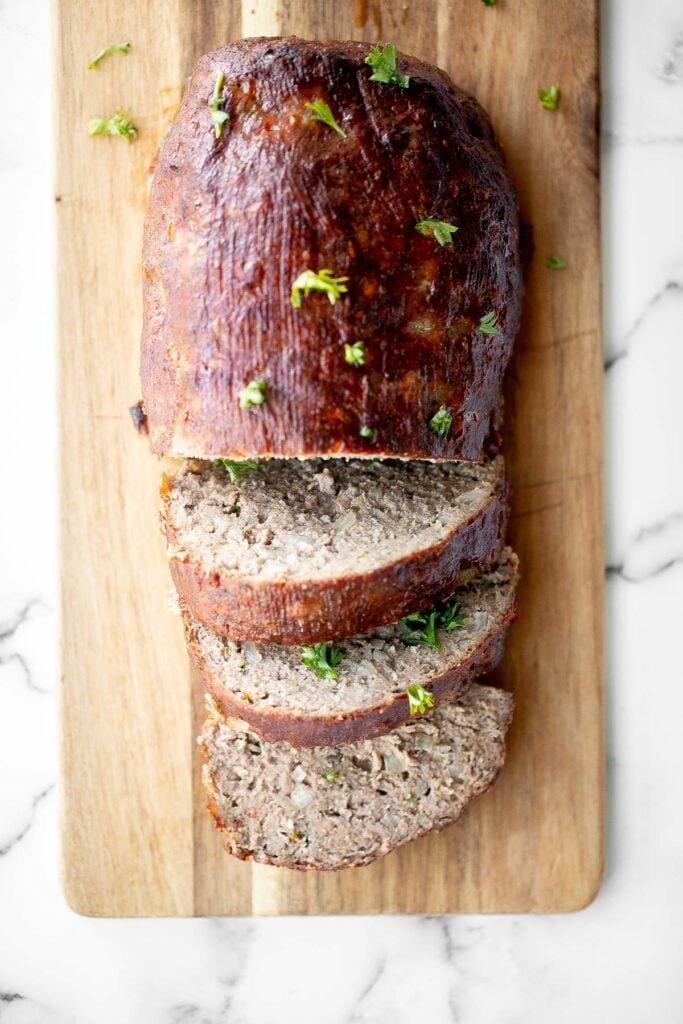 This hearty classic meatloaf with a caramelized glaze will nourish your body and soul. Feed the whole family with a simple yet flavourful classic. | aheadofthyme.com