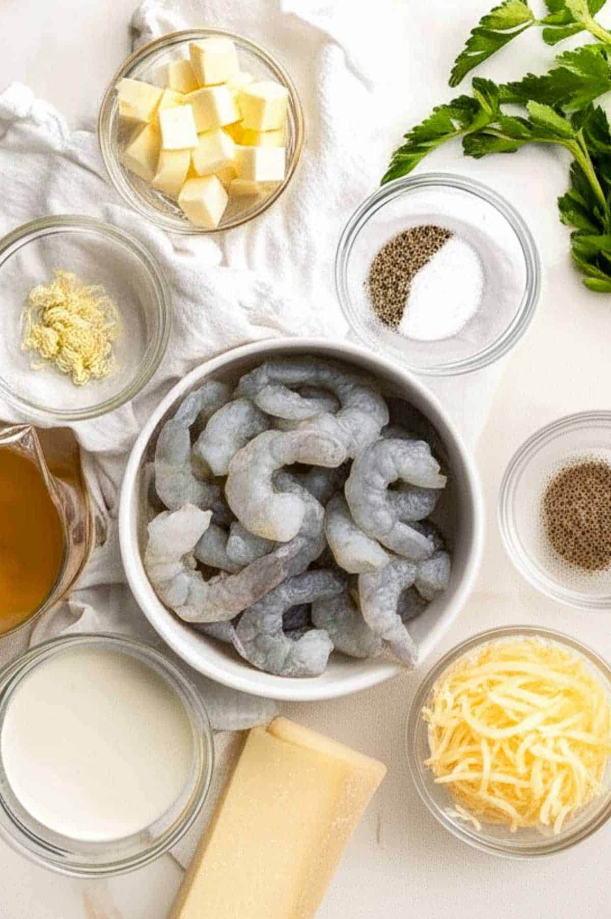Creamy Garlic Shrimp is a quick and easy 15-minute meal made with juicy shrimp in a cheesy garlic cream sauce. Perfect for weeknight dinners! | aheadofthyme.com