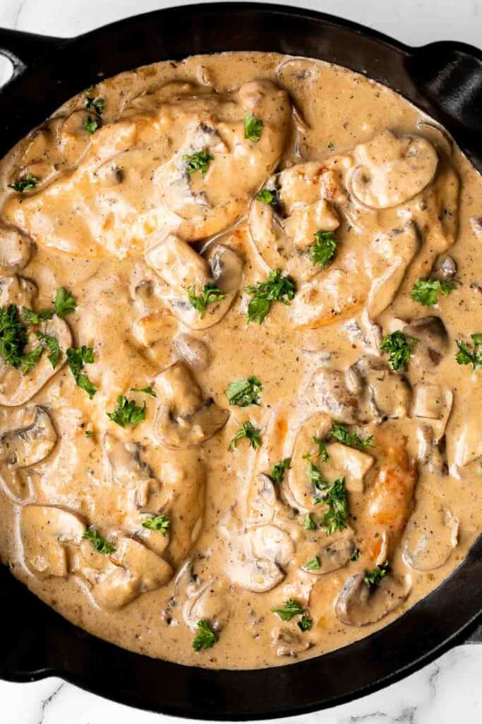 Easy Chicken Marsala is creamy, savory, and comforting. Juicy chicken in a silky, creamy mushroom marsala wine sauce ready in 30 minutes! | aheadofthyme.com
