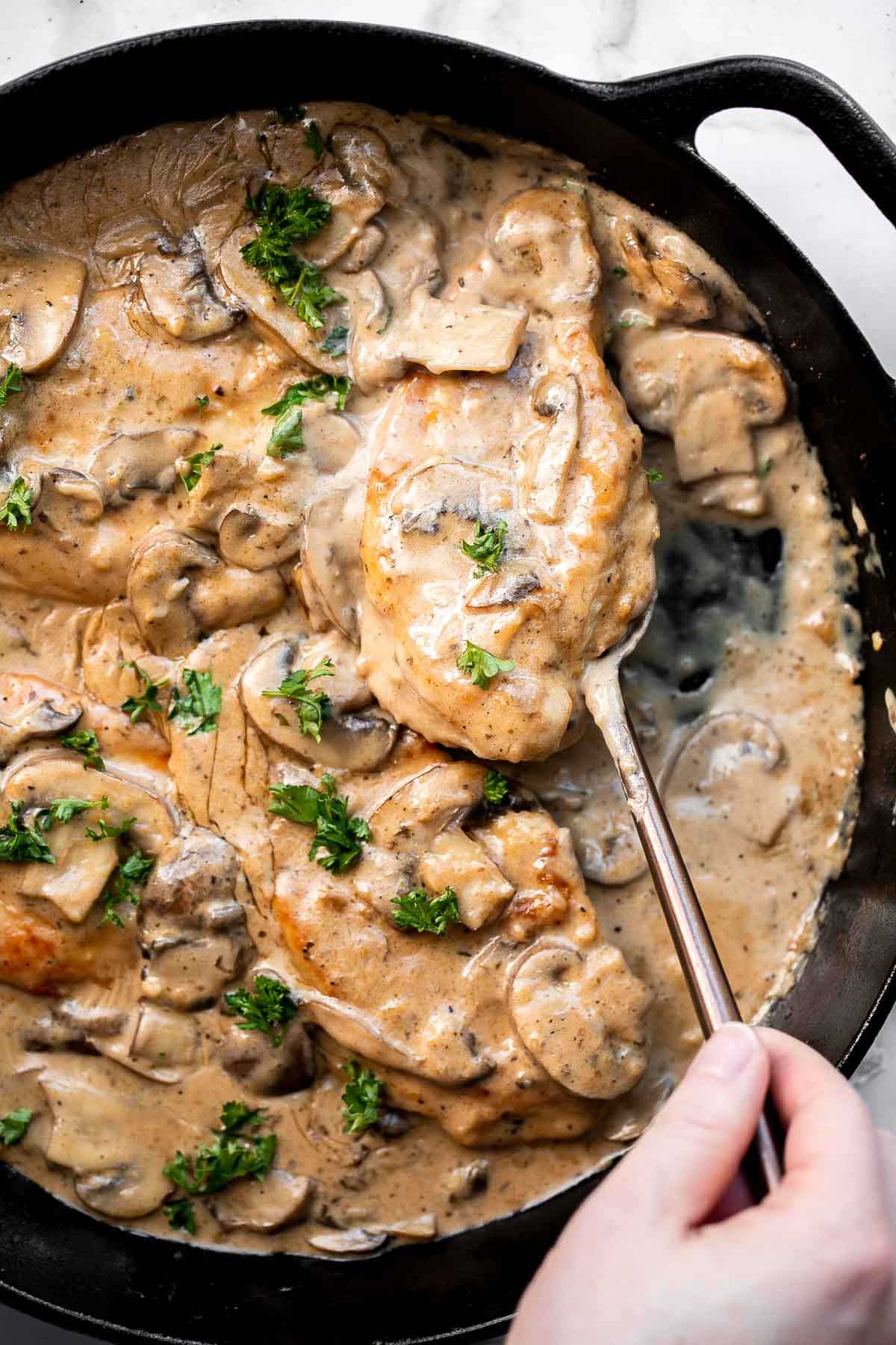 Easy Chicken Marsala is creamy, savory, and comforting. Juicy chicken in a silky, creamy mushroom marsala wine sauce ready in 30 minutes! | aheadofthyme.com