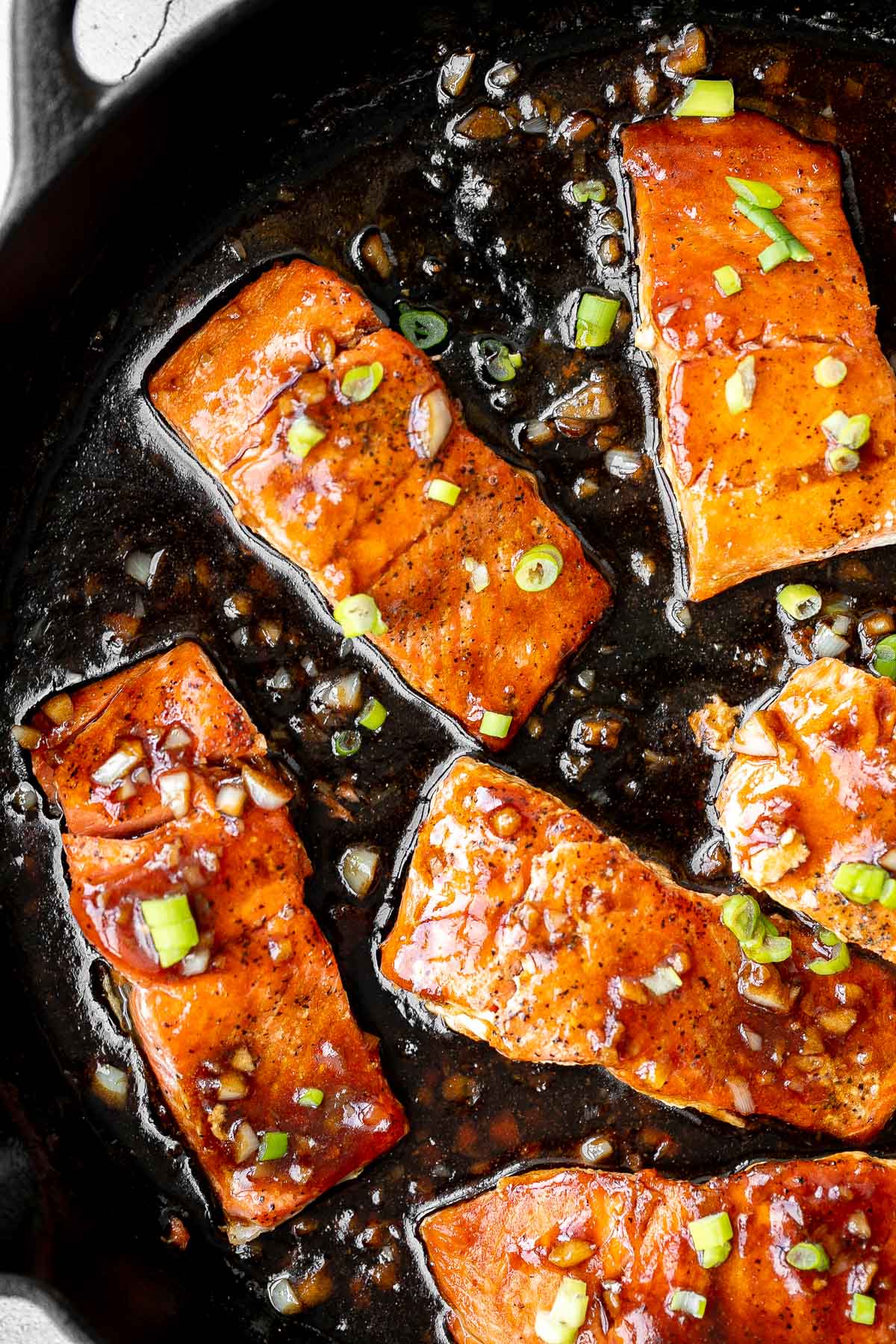 Sticky and sweet, easy honey garlic glazed salmon is one of the best salmon recipes to add to your weeknight dinner rotation. Ready in under 25 minutes. | aheadofthyme.com