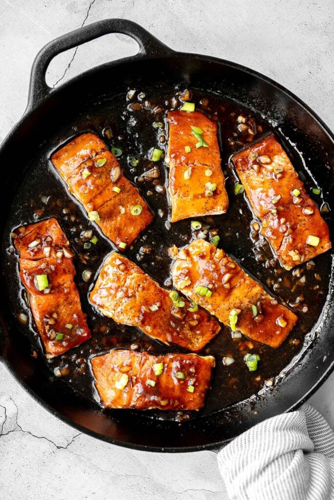 Sticky and sweet, easy honey garlic glazed salmon is one of the best salmon recipes to add to your weeknight dinner rotation. Ready in under 25 minutes. | aheadofthyme.com