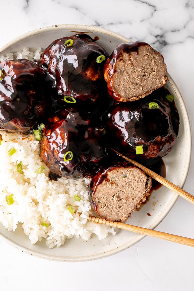 Lion's Head Chinese Meatballs are tender and juicy homemade pork meatballs packed with Asian seasonings and tossed in a sweet and sticky sauce. | aheadofthyme.com