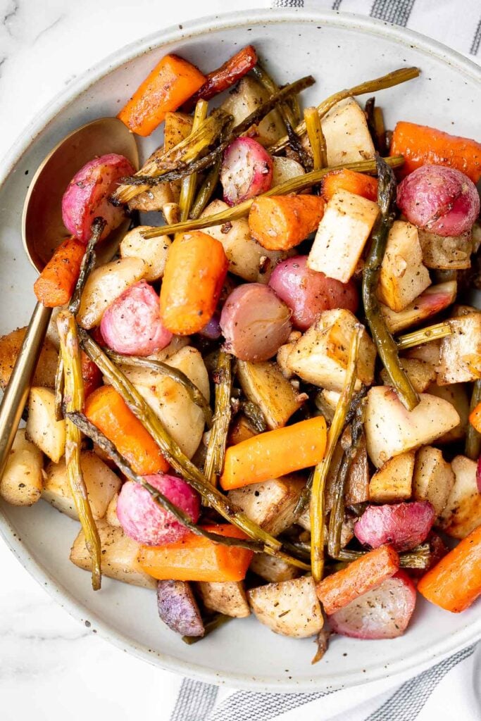 Roasted spring vegetables are an easy sheet pan side dish packed with all our favourite veggies of the season. Plus, it's so easy to prep and make. | aheadofthyme.com