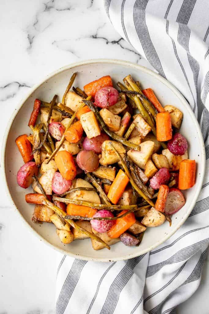 Roasted spring vegetables are an easy sheet pan side dish packed with all our favourite veggies of the season. Plus, it's so easy to prep and make. | aheadofthyme.com