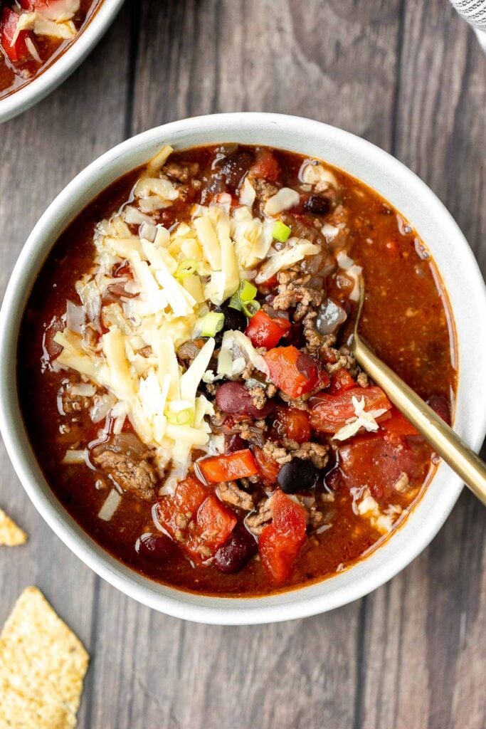 Hearty slow cooker beef chili is an easy, comforting, low-maintenance dinner in fall and winter months. It's a family favourite crockpot chili. | aheadofthyme.com