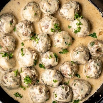 Delicious, comforting homemade Swedish meatballs are seared and smothered in a creamy gravy sauce and taste so much better than IKEA meatballs. | aheadofthyme.com