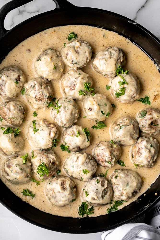 Delicious, comforting homemade Swedish meatballs are seared and smothered in a creamy gravy sauce and taste so much better than IKEA meatballs. | aheadofthyme.com